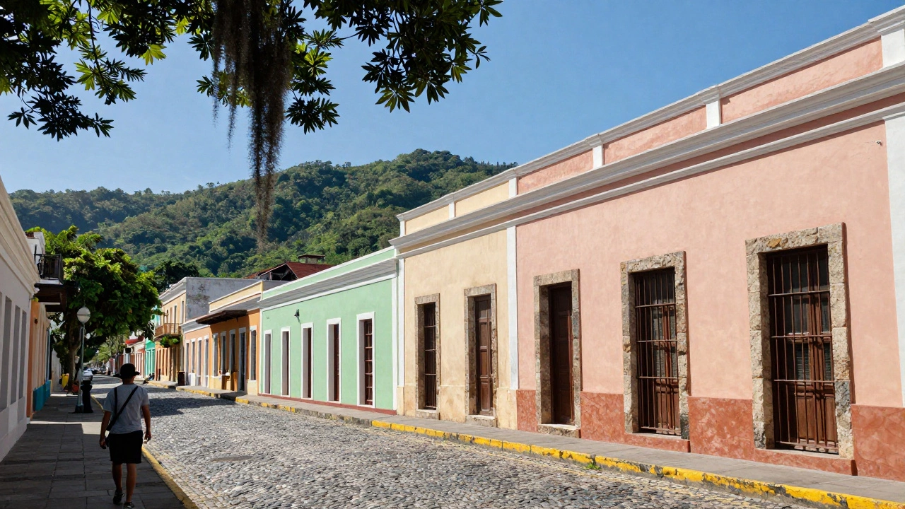Historic pastel buildings of Old San Juan with El Yunque forest in the background, Puerto Rico